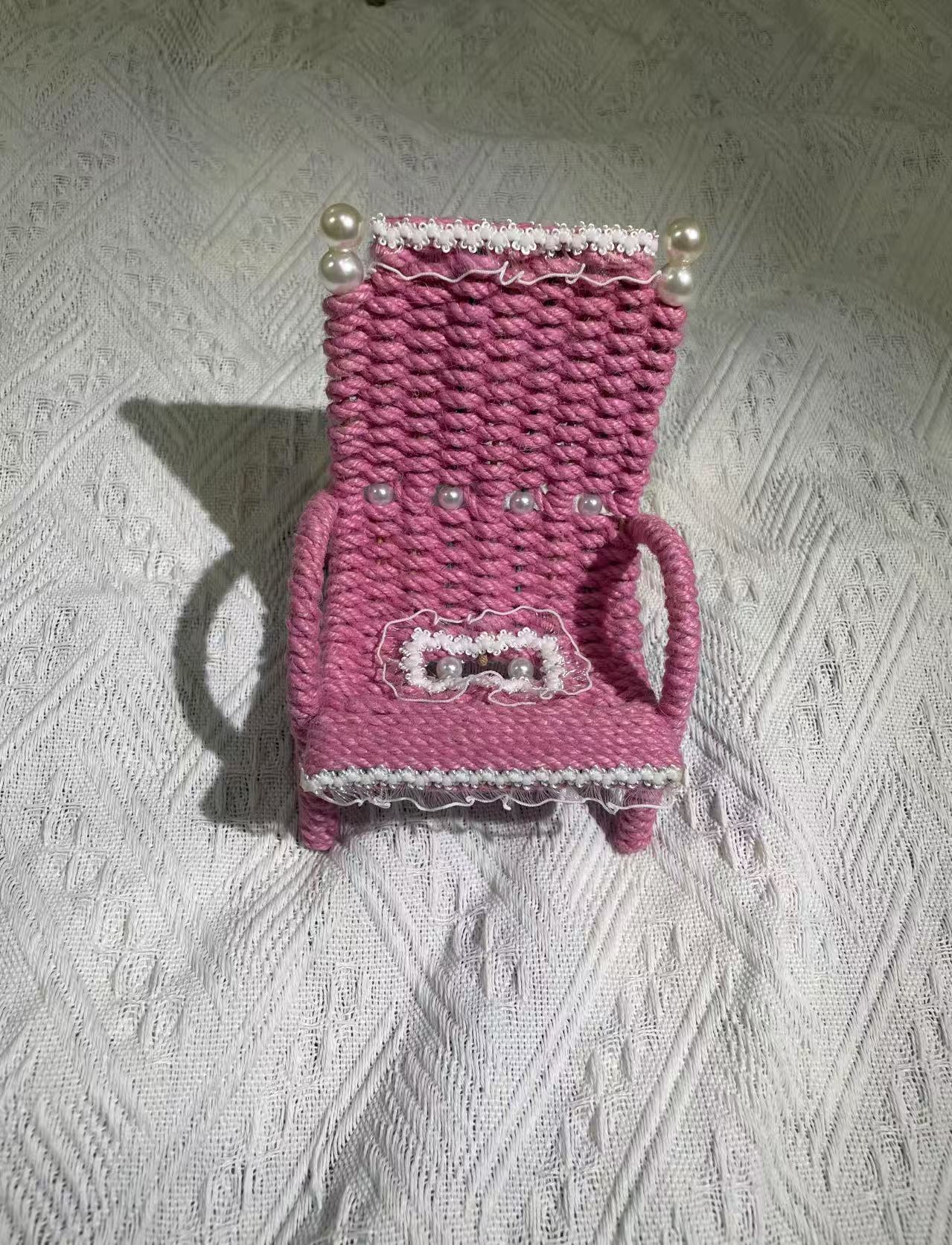 Hand woven chair shaped phone holder