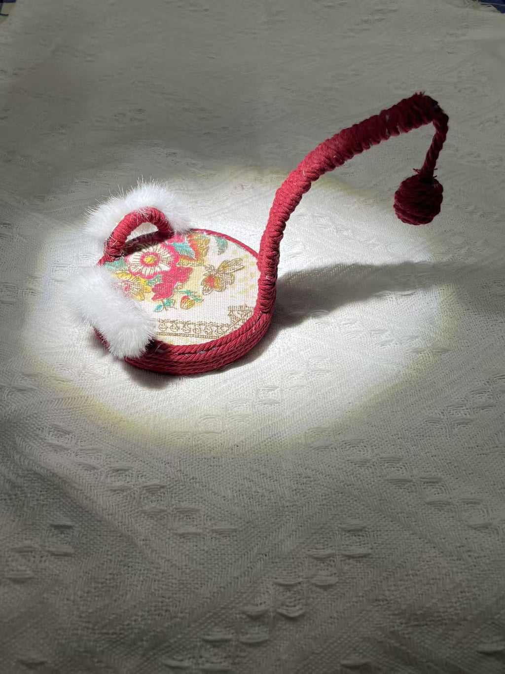 Hand woven cat shaped phone holder