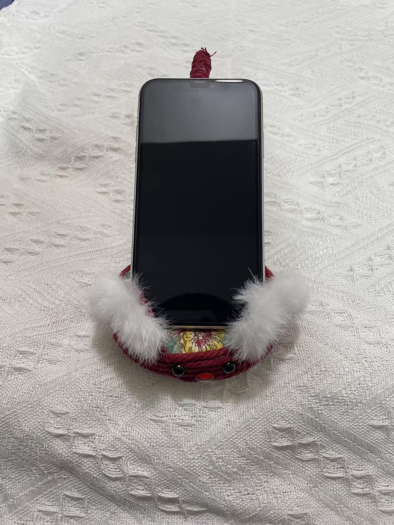 Hand woven cat shaped phone holder