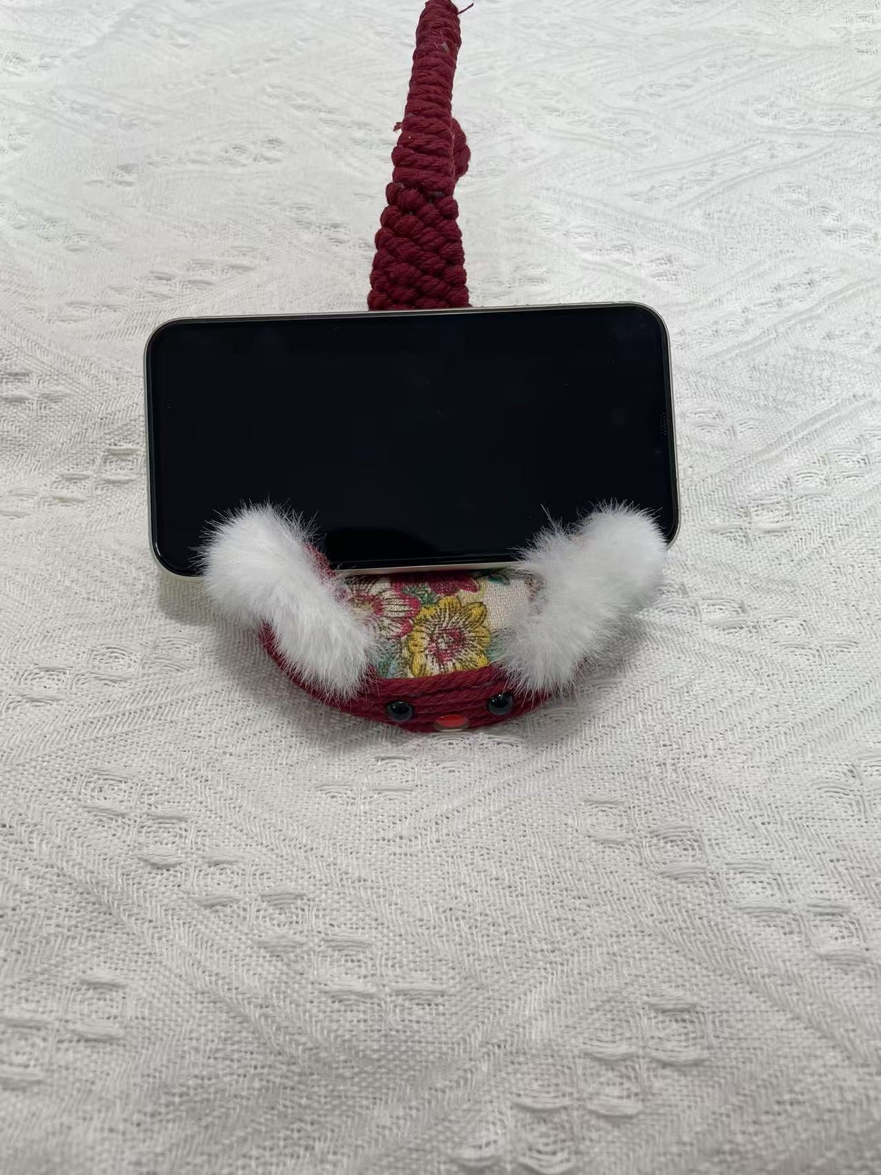 Hand woven cat shaped phone holder
