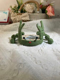 Handwoven crab-shaped phone holder